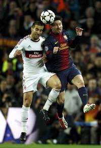 Pertandingan leg kedua babak 16 besar Liga Champions antara Barcelona kontra AC Milan dihelat di Camp Nou, Rabu (13/3/2013) dinihari WIB. Reuters/Gustau Nacarino.