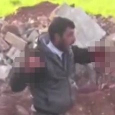 Mengerikan! Beredar Video Pemberontak Makan Jantung Tentara Suriah