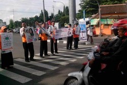 Ini Susuku, Matikan Rokokmu!