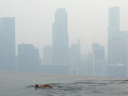 Singapura Dikepung Asap, Turis Diminta Pakai Masker