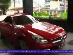 Septi Datang ke KPK Menggunakan Mobil Mewah