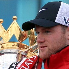 Neville Kembali Sarankan Rooney Bertahan di MU