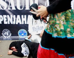 Tanpa Dilarang MA, Konsorsium Asuransi TKI Banyak Masalah