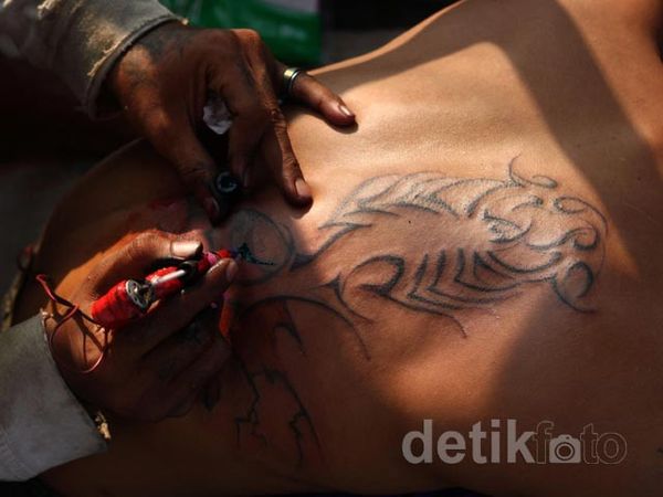 Memahami Bahaya Tato