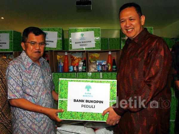 Bukopin Serahkan Bantuan Melalui DMI