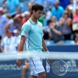 Djokovic Ditumbangkan Isner