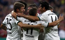 Para pemain Bayern Munich merayakan kemenangan. Reuters/Michaela Rehle.