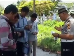 Usai Menilang, Polantas di Manado Doakan Para Pelanggar Lalin