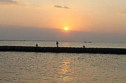 Oranye Senja di Langit Kupang