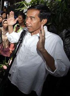 Jokowi Teken UMP DKI 2014 Rp 2,4 Juta