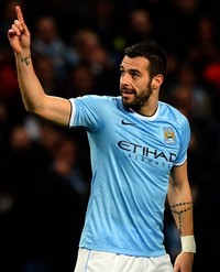 Alvaro Negredo merayakan gol yang dibuatnya. Dengan kemenangan ini, City berada di peringkat dua klasemen Grup D dengan mengumpulkan 12 poin dari lima pertandingan. AFP/Paul Ellis.