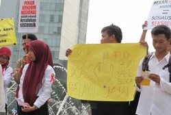 Aksi Tolak Pekan Kondom Warnai Peringatan Hari AIDS Sedunia