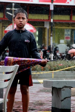 Profesi : Ojek Payung