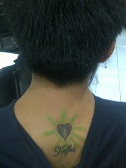 Ingat Anak, Tomy Bikin Tato Nama Buah Hatinya di Punggung