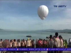 Merah Putih Raksasa Berkibar di Tengah Laut