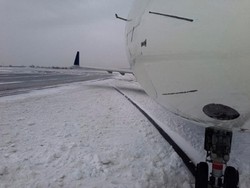 Badai Salju Membuat Bandara JFK di New York Stop Operasi
