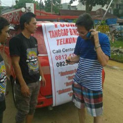 Ada Telepon Gratis Bagi Korban Banjir Manado