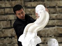 Seniman Kertas Unik China