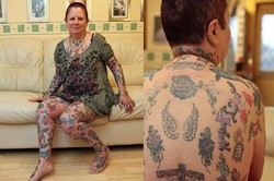 Foto: Penampilan Wanita yang Hiasi Seluruh Tubuh dengan 268 Tato