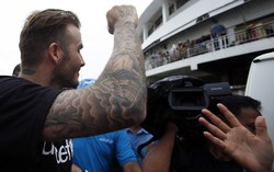 David Beckham mengunjungi korban topan Haiyan, Kamis (13/2/14). REUTERS/Erik De Castro.