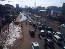 Banjir di Jl Abdullah Syafei Surut, Lalu Lintas Merayap Lancar