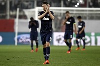 Anak asuhan David Moyes ini harus menerima kekalahan mereka dari Olympiakos, dan menatap pertandingan berikutnya di leg kedua yang akan di gelar di Old Trafford 19 Maret mendatang. (REUTERS/Yorgos Karahalis).