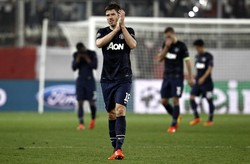 Anak asuhan David Moyes ini harus menerima kekalahan mereka dari Olympiakos, dan menatap pertandingan berikutnya di leg kedua yang akan di gelar di Old Trafford 19 Maret mendatang. (REUTERS/Yorgos Karahalis).