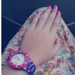 pink nailpolish and pink watch