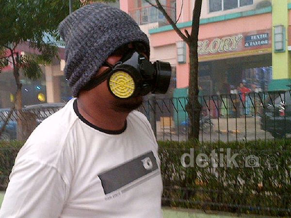 Warga Riau Bermasker 