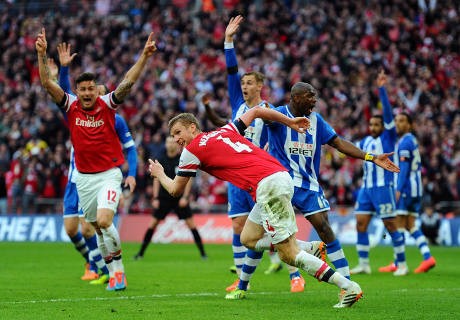 Singkirkan Wigan via Adu Penalti, Arsenal ke Final