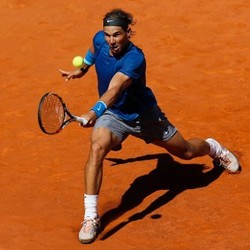 Nadal Melaju ke Semifinal