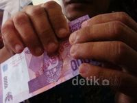 Sosialisasi Ciri-ciri Uang Asli Pada Tunanetra