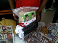 Relawan Jokowi-JK Laporkan Pembagian Beras ke Bawaslu