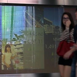 Koreksi Saham Teknologi Bikin Wall Street Flat