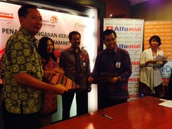 Kini Terima Uang dari TKI Bisa Diambil di Minimarket