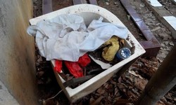 Selain di Atas Makam, Warga Cipinang Muara Temukan Kafan di Tong Sampah