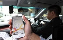 Taksi Uber Umbar 100 Ribu Voucher