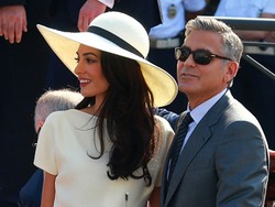 Amal dan George Clooney Ingin Adopsi Anak dari Negara Konflik