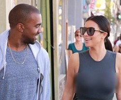 Ups, Kim Kardashian Lupa Pakai Bra Saat Kencan dengan Kanye West