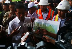 Hujan Deras Iringi Presiden Jokowi Terbang ke Papua