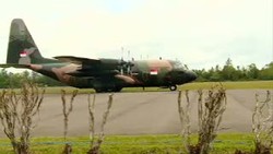 Robot Pendeteksi Sinyal Singapura Ikut Lacak Badan Pesawat AirAsia