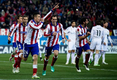 Atletico Tundukkan Madrid 2-0