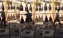 Parah! Turis Tiongkok Tendang Lonceng Doa di Thailand