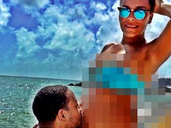 Ludacris Cium Perut Hamil Istri di Pinggir Pantai