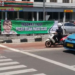 Beredar Spanduk Serangan untuk Menkum HAM Yasonna Laoly
