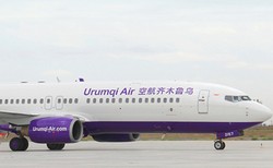 Dikira Pegangan Tangan, Pria Tiongkok Buka Pintu Darurat Pesawat