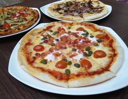 Penggemar Pizza Wajib Mencicipi 11 Jenis Pizza Unik di Tempat Ini