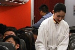 Ketika Pramugari Tiongkok Pakai Piyama Saat Bekerja