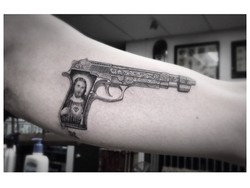 Tato Baru G-Dragon Bigbang: Pistol Bergambar Yesus