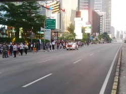Nguing! Via Mobil Patroli, Polisi Imbau Pekerja Kantoran Pulang Gunakan Ojek